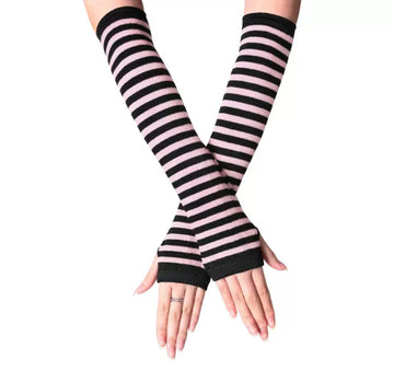 Tight-fitting mittens in light pink with black accents