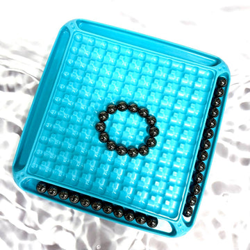 Magnetic marble game