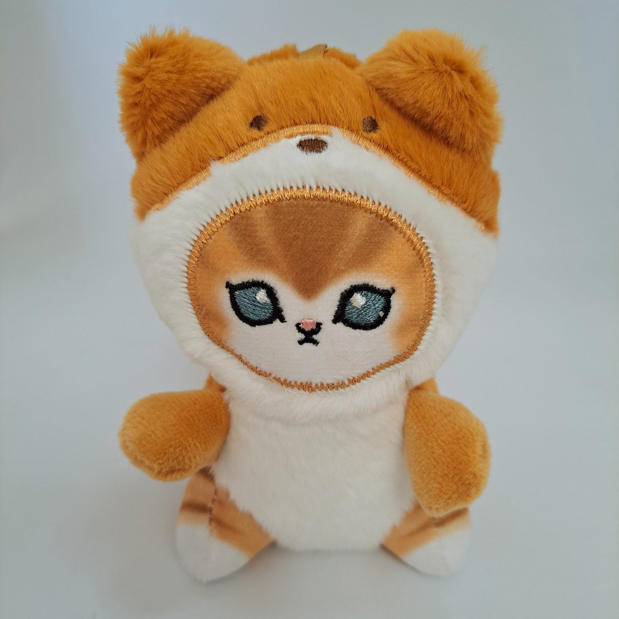 Soft Cat Keychain in a Teddy Bear Costume (White Belly)