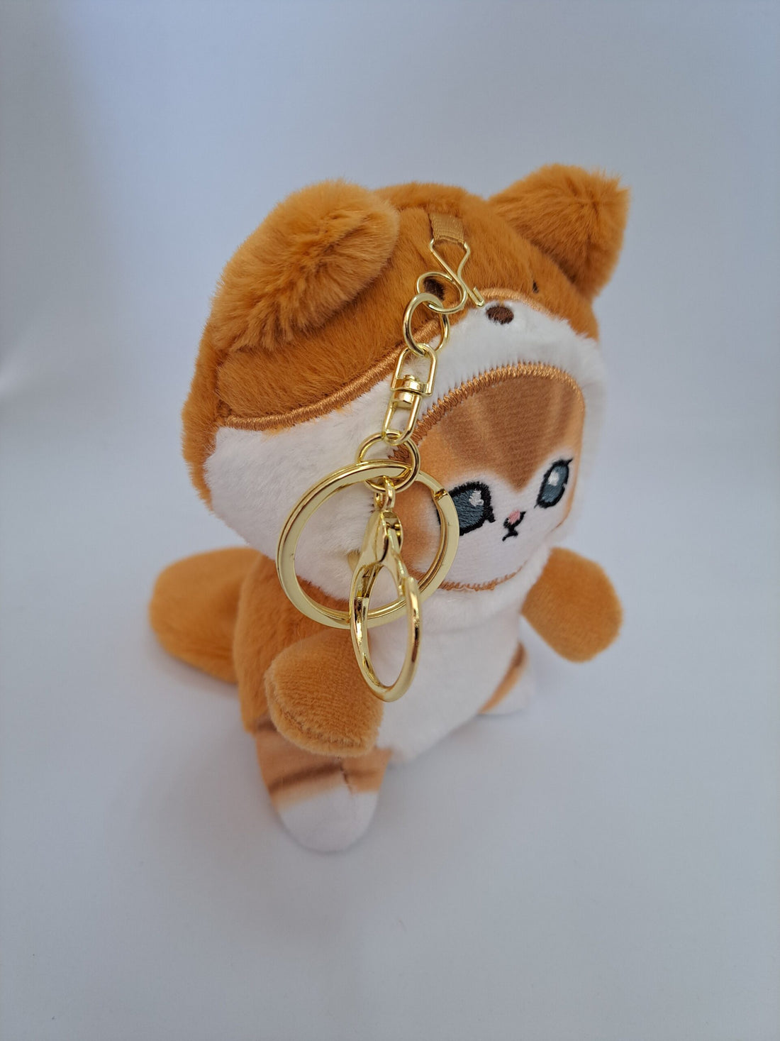 Soft Cat Keychain in a Teddy Bear Costume (White Belly)