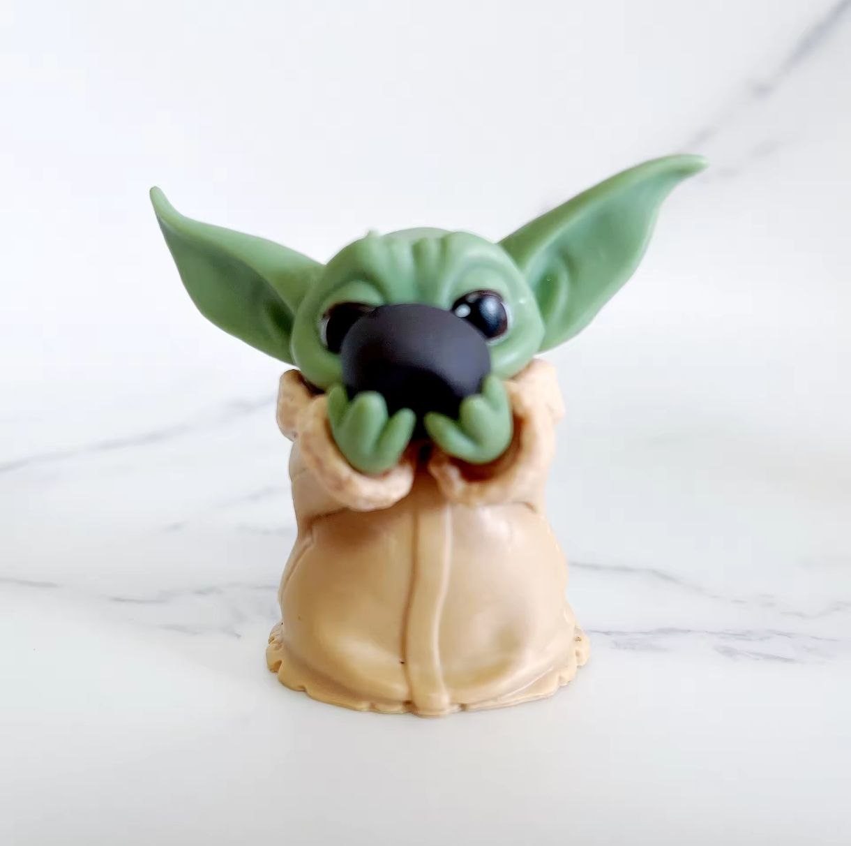 Collectible figure from Star Wars/The Mandalorian: "Little Yoda Grogu"