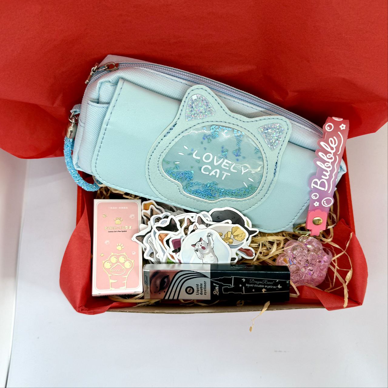 Gift Set for Girls (pencil case, Paw Print keychain, lip balm, 50 stickers, 2-in-1 eye liner)
