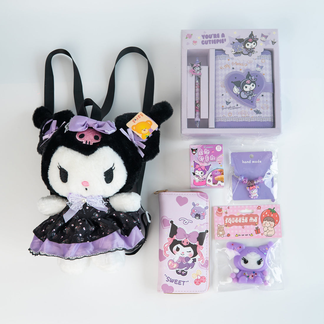 Kuromi Gift Set (toy backpack, notebook + pen, wallet, bracelet, stickers, squishy)